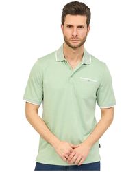 Bugatti - Grünes poloshirt mit tasche und kontrastdetails - Lyst