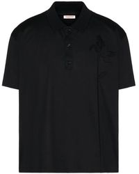 Valentino Garavani - T-shirt e polo nere con applicazione floreale - Lyst