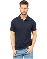 Guess - Blaues polo shirt slim fit bestickt - Lyst