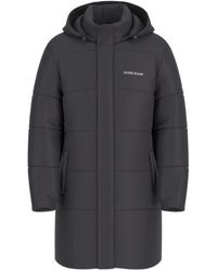 Guess - Schwarze Steppdaunenjacke Mit Kapuze - Lyst