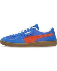 PUMA - Schoenen ,Blauw ,Suède Blauw/Oranje Suède Lage Schoen - Lyst