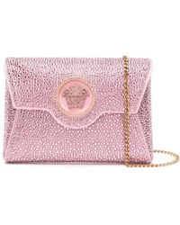 Versace - Bags > clutches - Lyst