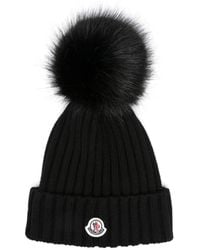Moncler - Schwarze strick pompom mütze - Lyst