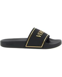 Versace - Rubberen Slippers - Lyst
