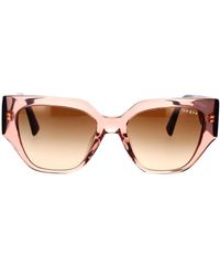 Vogue - Sonnenbrille mit unregelmäßiger form und mutigem und dynamischem stil - Lyst