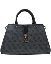 Guess - Handbags - Lyst