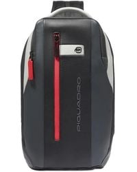 Piquadro - Sling Bag Im Ipad-Format Aus Leder Mit Rucksack-Option Und Tasche Für Airpods, Rfid-Geschützt - Lyst