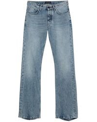 Balenciaga - Light Jeans With Distressed Hem - Lyst