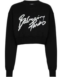Balmain - Hoodies & Sweatvesten ,Zwart ,Katoen Cropped Sweatshirt Van Bedrukt Katoen - Lyst