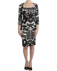 Roberto Cavalli - Kleedjes ,Zwart ,Elegante Jersey Sheath Jurk Met Print - Lyst
