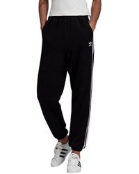 Pantalones de chándal y joggers adidas Originals de mujer: hasta el 60 % de  descuento | Lyst