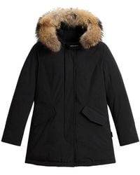 Woolrich - Parka in tessuto tecnico nero con pelliccia - Lyst