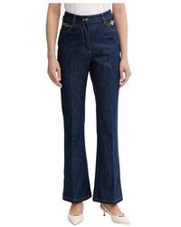 Patou - Flared Jeans - Lyst