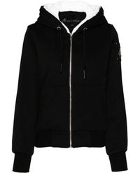 Moose Knuckles - Cappotto nero in cotone con finitura in pelliccia sintetica - Lyst