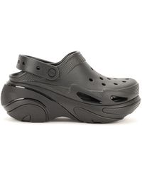 Crocs™ - Schoenen ,Zwart ,Zwarte Platte Sandalen Met Verstelbare Band - Lyst