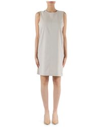 Calvin Klein - Vestido corto de tela elástica con placa de logo - Lyst