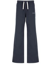 Palm Angels - Pantaloni in cotone blu con logo ricamato - Lyst