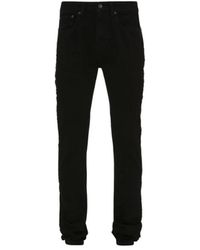 JW Anderson - Slim-fit twisted jeans - Lyst