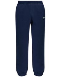 Lacoste - Broeken ,Blauw ,Katoen Trainingsbroeken Met Logopatch - Lyst