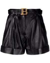 Balmain - Leder-shorts mit logo-schnalle und goldfarbener hardware - Lyst