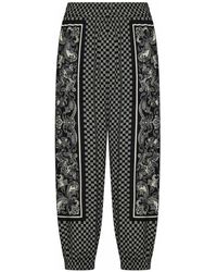 Balmain - Schwarze viskose freizeithose mit mini monogramm-druck,bedruckte viskosehose - Lyst