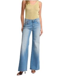 Kocca - Jeans ,Blauw ,Denim Pijpen Met Uitlopende Pijpen Die Je Benen Langer Laten Lijken - Lyst