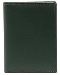 Comme des Garçons - Portafoglio piccolo bi fold in pelle - Lyst