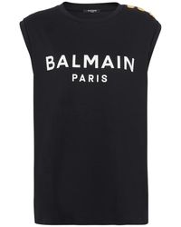 Balmain - Top negro sin mangas con detalles de botones decorativos - Lyst