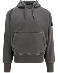 Stone Island - Grauer hoodie mit knöpfen und kordelzug - Lyst