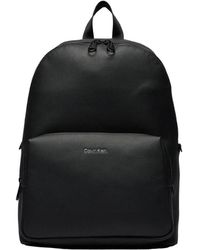Calvin Klein - Schwarzer rucksack mit reißverschluss und mehreren taschen - Lyst