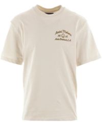 Amiri - T-shirt in jersey di cotone alabastro con logo motors - Lyst
