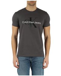 Calvin Klein - T-shirt in cotone con stampa logo frontale - Lyst