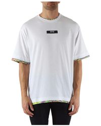 Versace - Relaxed fit baumwoll-t-shirt mit kontrasteinsätzen - Lyst