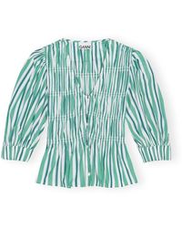 Ganni - Blusa verde a righe in cotone con scollo a v - Lyst