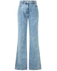 Moschino - Flared Jeans - Lyst