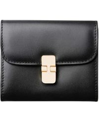 A.P.C. - Schwarzes Leder Portemonnaie Mit Goldenem Verschluss - Lyst
