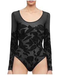 Wolford - Body tattoo floral sin costuras - Lyst