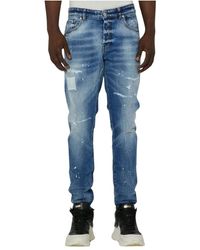 John Richmond - Helle waschung slim fit ripped jeans - Lyst