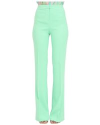 Pinko - Pantalones elegantes flare-fit verdes de crêpe stretch - Lyst