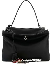 Balenciaga - Schwarze Leder-Schultertasche Mit Anhänger - Lyst