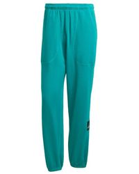 adidas - Fitness ,Groen ,Katoen Reflecterende Broek Groen Stijlvol Functioneel - Lyst