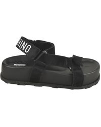 Moschino - Flat Sandals - Lyst