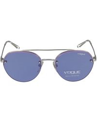 Vogue - Gafas de sol elegantes para días soleados - Lyst