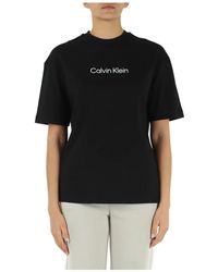 Calvin Klein - T-shirt in cotone con scritta logo frontale - Lyst