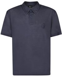 Brioni - Polo in lana blu manica corta - Lyst