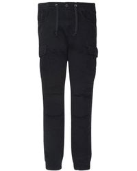 Schott Nyc - Cargo stretch multipocket hose - Lyst