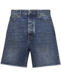 Palm Angels - Blaue frayed denim shorts mit logo - Lyst