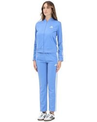 adidas - Essentials 3-Stripes Blauw Sportief Jumpsuit - Lyst