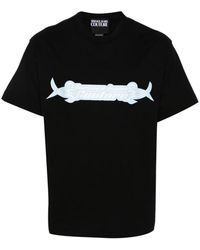 Versace - Schwarze logo print t-shirts und polos - Lyst