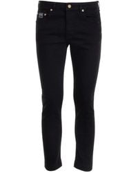 Versace - Jeans regular fit neri 5 tasche - Lyst